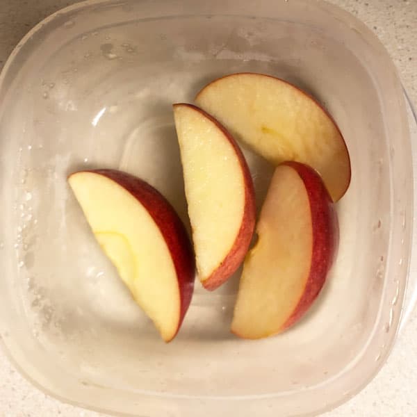 Sliced apples in apple juice