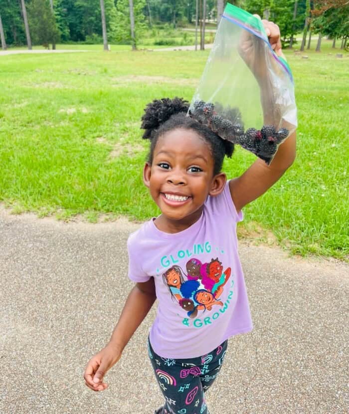 A kid moving and exercising, healthy  family tip, and fun wellness.
